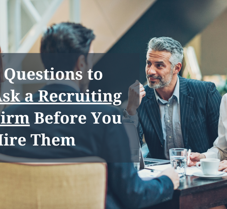 A person sitting at a desk with a laptop and a notebook in front of them, with a sign that says 'Questions to Ask a Recruiting Firm Before You Hire Them' written on it. The post provides insights on how to find the right recruiting firm for your company by asking the right questions about their recruitment process, screening and evaluation, references, success rate, communication, diversity and inclusion, and pricing structure.